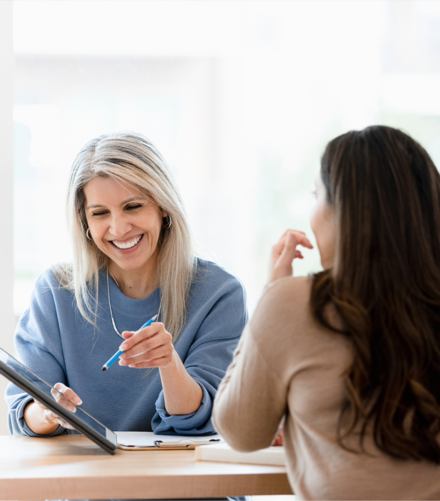 Accounting professional meeting with a client in an office