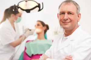 Dentist in dental office