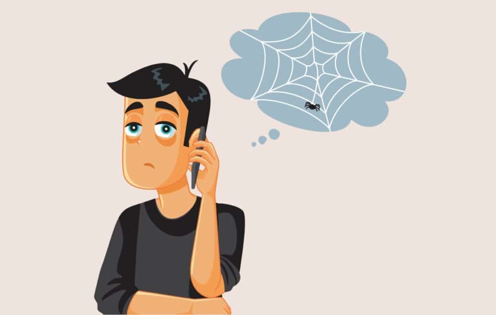 Easy On Hold | Blog - A frustrated caller on hold endures a generic, cobweb-covered experience — the opposite of a custom on-hold message.